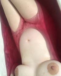 Pregnant teen in bath photo