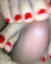 Femdom Playing Footjob with Small Hard Off Penis. photo