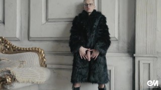 Blond twink boy nude in fur coat shows his long uncut cock