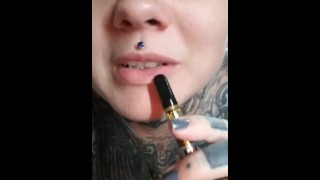 Smoking sexy eyes face tattoos