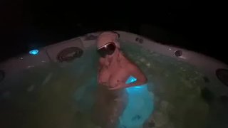 Sexy ski bunny sucks cock in outdoor jacuzzi 