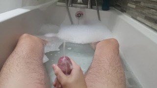 Stroking my hard cock in the bath and spurting cum