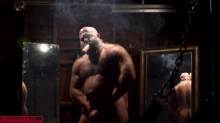 HYPER MASCULINE MUSCLE HAIRY BULL SMOKING HIS CIGAR IN FRONT OF THE SLING