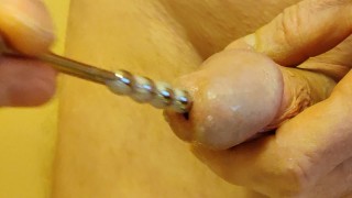 Insertion of my new extra long urethral plug.