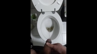 a big uncut cock peeing