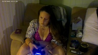 Hot Mom Smoking Cigarettes Playing video Games In Purple Bra and Panties