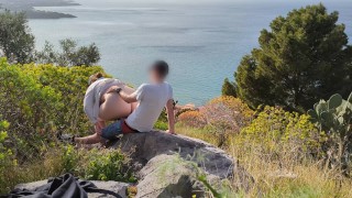 Spontaneous sex while hiking with a view over the city