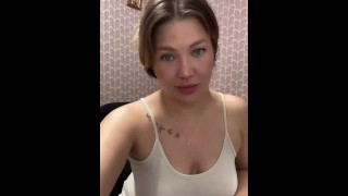 Pretty girl with great breasts dancing in front of the camera.