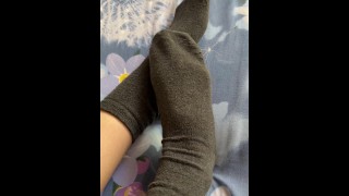 Caresses of my long legs in grey socks
